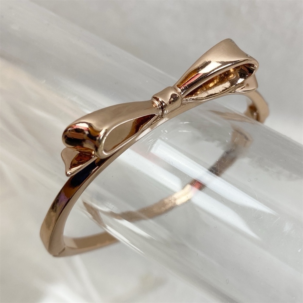 KATE SPADE • Rose Gold Bow Love Notes Bangle Bracelet - Picture 3 of 10